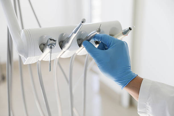 Professional Tooth Extraction technician working in Baldwin City, KS